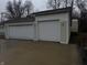 Detached garage with two car garage doors is displayed at 326 W State Road 42, Mooresville, IN 46158