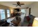 Bright living room with french doors to backyard, leading into the kitchen area at 326 W State Road 42, Mooresville, IN 46158