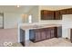Open-concept kitchen with sleek, dark cabinetry and a functional layout at 3693 Berkdale Dr, Columbus, IN 47203
