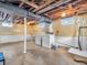 Bright basement laundry area featuring a washer and dryer, with ample space for storage and utility equipment at 4592 Gordon Dr, Plainfield, IN 46168