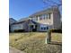 Well-maintained two-story home with attached garage, lush lawn, and traditional architectural details at 5124 Deer Creek Ct, Indianapolis, IN 46254