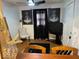 A relaxing living room with decor and natural-colored wooden floors at 542 N Tremont St, Indianapolis, IN 46222