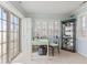 Bright home office with natural light and sliding glass door to outdoors at 6103 Lazy Ln, Indianapolis, IN 46259