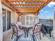 Cozy patio featuring a pergola, outdoor table with seating, and a barbecue grill creating a delightful space for al fresco dining at 6905 Percy Dr, Indianapolis, IN 46113