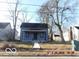 Charming single-Gathering home featuring a cozy front porch and classic architectural details at 711 W Centennial Ave, Muncie, IN 47303