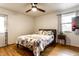 Bedroom with hardwood floors, ceiling fan, and lots of natural light at 7671 Sherry Ln, Brownsburg, IN 46112