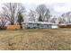 Charming single-story home featuring a well-manicured lawn and brick facade at 7671 Sherry Ln, Brownsburg, IN 46112