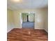 The living room boasts hardwood floors, a doorway, and a bright, inviting space at 823 Collier St, Indianapolis, IN 46241