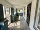 Enclosed porch with lots of natural light with access to the home's interior at 823 Collier St, Indianapolis, IN 46241