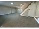 Spacious finished basement area with new carpeting, perfect for entertainment or additional living space at 8468 N Baltimore Rd, Monrovia, IN 46157