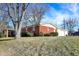 Charming single-story home with brick siding, well-maintained landscaping, and attached garage at 8525 Edith St, Martinsville, IN 46151