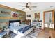 Charming bedroom featuring a bed, unique wood and painted accent walls, and natural light at 11850 Deer Walk Dr, Cicero, IN 46034