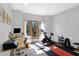 Home office and gym featuring ample desk space, natural light, and exercise equipment at 11850 Deer Walk Dr, Cicero, IN 46034