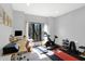 Home office and gym featuring ample desk space, natural light, and exercise equipment at 11850 Deer Walk Dr, Cicero, IN 46034