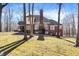Spacious brick home with a charming outdoor fireplace and ample backyard space at 11850 Deer Walk Dr, Cicero, IN 46034
