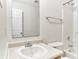 Clean bathroom featuring a single sink vanity, toilet, and bathtub with shower at 12243 Belfry Dr, Noblesville, IN 46060