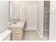 Bright bathroom with a light wood vanity and mirror at 12243 Belfry Dr, Noblesville, IN 46060