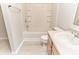 Bright bathroom featuring a tiled bath and shower combo and a single sink vanity at 12243 Belfry Dr, Noblesville, IN 46060