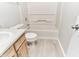 Bathroom with modern flooring, toilet, sink vanity, and shower-tub combo at 12243 Belfry Dr, Noblesville, IN 46060