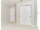 Bedroom featuring neutral carpet, light walls, a window, and a closet for storage at 12243 Belfry Dr, Noblesville, IN 46060