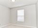 Clean bedroom with carpet, light fixture, one window, and outlets at 12243 Belfry Dr, Noblesville, IN 46060