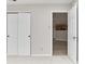 Bedroom features double closets, access to another room, carpeted floor, neutral paint at 12243 Belfry Dr, Noblesville, IN 46060