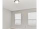 Bedroom with carpet, neutral paint, ceiling light, and two windows at 12243 Belfry Dr, Noblesville, IN 46060