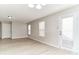 Large living room with big windows and a glass door for natural light at 12243 Belfry Dr, Noblesville, IN 46060
