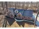 Aerial view of brick home featuring a mature treed lot, gabled roof, and charming curb appeal at 1285 W Judson Ln, Mooresville, IN 46158
