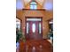 Spacious foyer with high ceilings, hardwood floors, and decorative glass front door at 1285 W Judson Ln, Mooresville, IN 46158