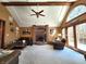 Spacious living room with vaulted ceilings, fireplace, and ample natural light at 1285 W Judson Ln, Mooresville, IN 46158
