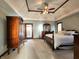Main bedroom features a tray ceiling, a wardrobe, and bright natural light from the windows at 1285 W Judson Ln, Mooresville, IN 46158