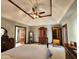 Main bedroom with tray ceiling offers access to the main bath and has a large wardrobe at 1285 W Judson Ln, Mooresville, IN 46158
