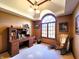 Comfortable office with desk, rocking chair, and a large arched window at 1285 W Judson Ln, Mooresville, IN 46158