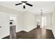 Bedroom featuring an ornamental ceiling light, ceiling fan, and access to other rooms at 1304 N Tuxedo St, Indianapolis, IN 46201