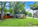 Well-maintained home with a vibrant yard and wooden deck in a charming neighborhood, perfect for Gathering living at 1304 N Tuxedo St, Indianapolis, IN 46201