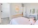 Cozy bedroom with light decor, a bright window, and a walk-in closet, creating a comfortable retreat at 13383 Vickery Ridge Dr, Fishers, IN 46037