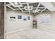 Finished basement shows neutral paint, carpeted flooring, recessed lights, and a unique coffered ceiling at 14466 Integrity Ct, Carmel, IN 46033