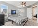 Bedroom featuring a bed, neutral walls, and lots of natural light from large windows at 14466 Integrity Ct, Carmel, IN 46033