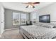Bedroom featuring a bed, neutral walls, and lots of natural light from large windows at 14466 Integrity Ct, Carmel, IN 46033