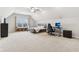 Spacious bedroom featuring vaulted ceilings, a ceiling fan, a bed, and a window seat at 14466 Integrity Ct, Carmel, IN 46033