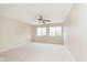 Spacious bedroom with carpet and windows providing natural light at 1457 Dominion Dr, Zionsville, IN 46077