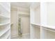 Organized walk-in closet with custom shelving and ample storage space at 1457 Dominion Dr, Zionsville, IN 46077