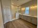 Modern bathroom with dual vanities and a luxurious walk-in shower at 15871 Vitalize Run, Fishers, IN 46040
