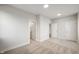Carpeted bedroom with two open doorways showing a bathroom, and a closet at 15871 Vitalize Run, Fishers, IN 46040