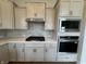 Gourmet kitchen features stainless steel appliances and sleek countertops at 15871 Vitalize Run, Fishers, IN 46040