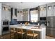 Spacious kitchen with a large island, stainless steel appliances, and ample cabinet space at 15871 Vitalize Run, Fishers, IN 46040