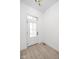 Well-lit entryway with wood-look flooring and a classic white front door at 17364 Pinellas Ave, Westfield, IN 46074