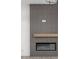 Sleek fireplace with a linear design, creating a cozy focal point at 17364 Pinellas Ave, Westfield, IN 46074