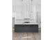 Modern kitchen with a large island, pendant lighting, and stainless steel appliances at 17364 Pinellas Ave, Westfield, IN 46074